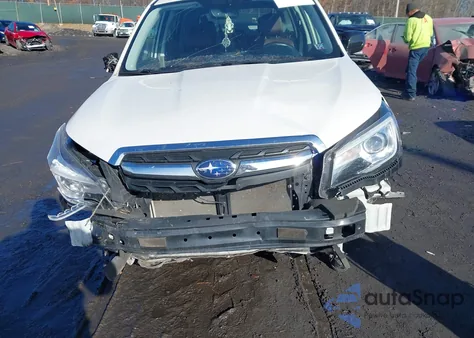 2017 Subaru Forester 2.5I Touring z USA, uszkodzony, nr VIN JF2SJATC6HH514998